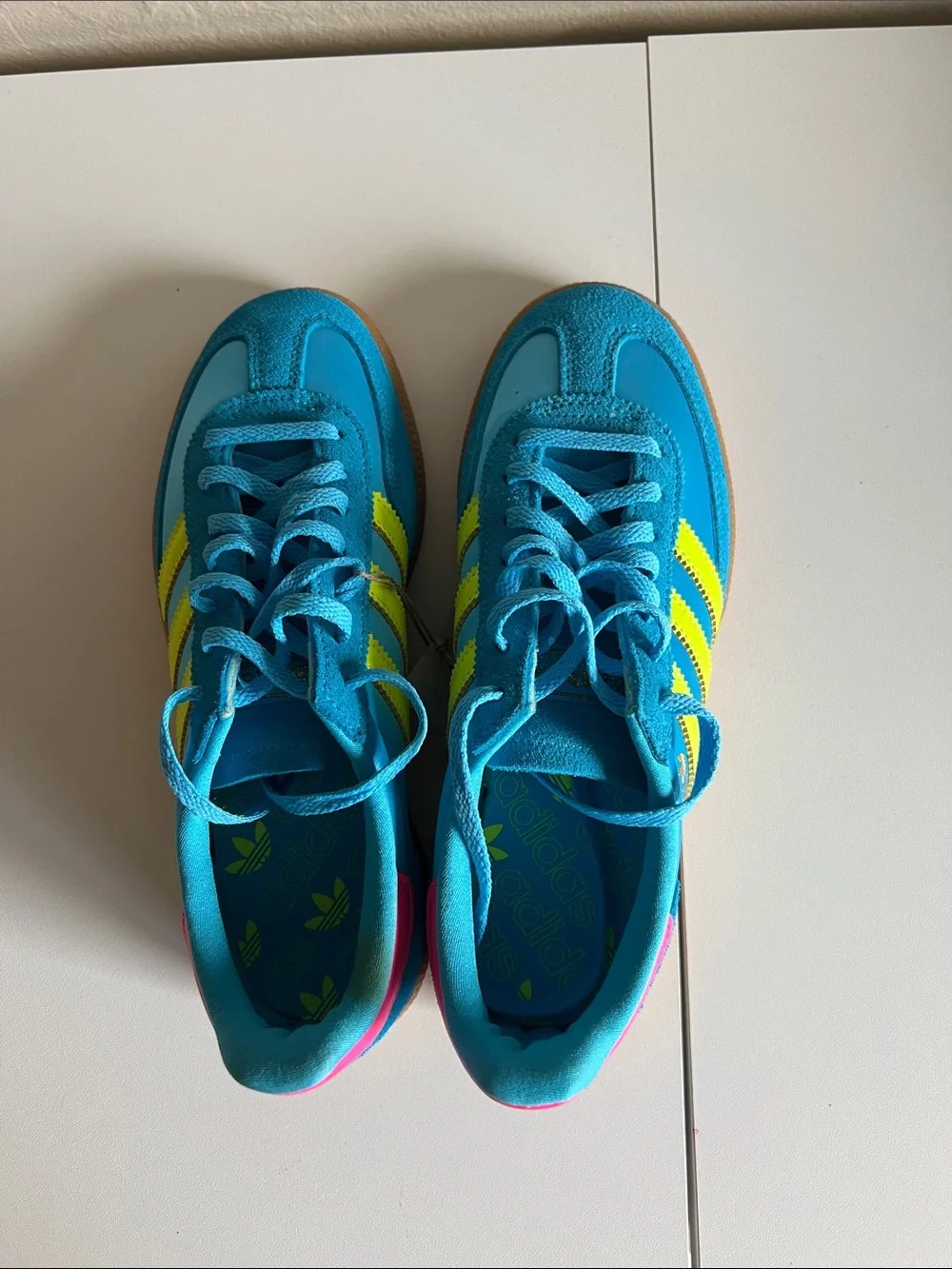 adidas Bright Turquoise Sneakers with Neon Yellow Stripes and Pink Accents